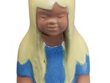 a figurine of a little girl sitting on the ground with a stuffed animal
