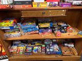 a lot of toys on the shelves in the store