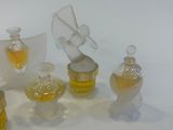 a lot of glass items that are sitting on a table