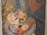 une peinture à l'huile représentant deux poupées dans un bol posé sur une table
