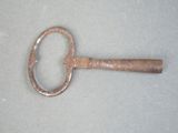 an old key that is sitting on a table