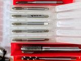 many different types of screws in a plastic case