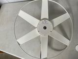 a white fan that is sitting on a table
