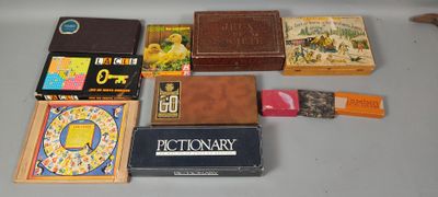 a lot of books and other items on the table