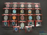 a lot of different colored stones in a display case