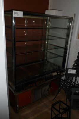 a glass table with a glass top in the middle of a room