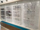 many glasses on display in a store window