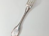 a fork that is sitting on a table