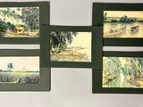 four framed pictures of a farm scene with cattle in a field