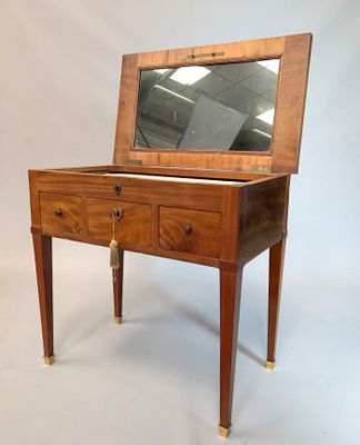 * BARBIERE En acajou et placage d'acajou flammé Plateau chem…