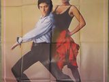 the poster for the movie carmen is hanging on the wall