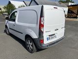 a white van that is parked in a parking lot