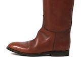 a close up of a pair of brown boots on a white background