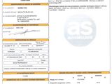 un gros plan d'un document sur lequel figure la photo d'une personne