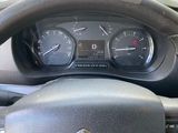 the dashboard of a car with a steering wheel and gauges