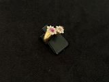 a close up of a ring on a black surface on a black surface