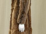 an image of a mannequin dressed in a fur coat