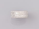a white gold ring with baguets of diamonds