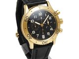 an image of a gold and black watch on a black leather strap