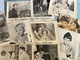 a lot of old photos of women on the bed