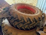 a large tire sitting on top of a pile of boxes