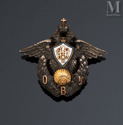 an image of a badge with an eagle and shield on it