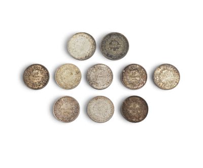 several different types of buttons on a white surface