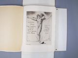 an open book with a drawing of a woman on it