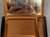 someone is taking a picture of their reflection in a mirror