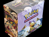 a box of pokemon trading cards on a black background