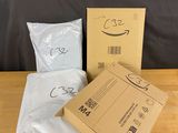 a box of white bags sitting on top of a wooden table