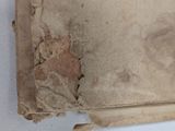 a piece of paper that has been torn off of it
