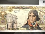 une photo d'un billet de banque en papier sur lequel figure le portrait d'un homme