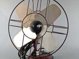 a small fan that is on top of a table