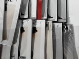 a lot of different cell phones on display in a store