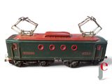 a green and red train car on a white background