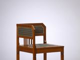 an image of a wooden chair with a woven seat on a white background