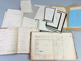 a lot of papers that are sitting on a table