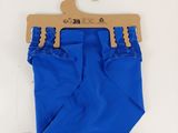 a blue pants hanging on a hanger on a white surface