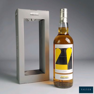 an image of a bottle of alcohol sitting next to a box