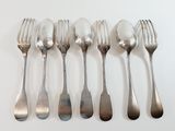five forks and six spoons arranged in a row