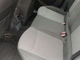 a seat in the back of a car that is empty