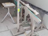 two tables that are sitting in the middle of a room