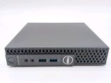 a close up of a dell desktop computer on a white surface
