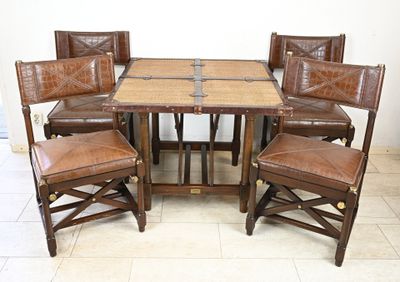 a table with four chairs and a table with four chairs
