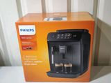 packaging of a philips coffee machine sitting on top of a table
