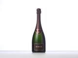 a close up of a bottle of champagne on a table