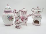 three different types of teapots on a white background