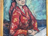 painting of a woman in a red dress sitting on a couch