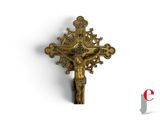 a gold cross with a crown on top of it